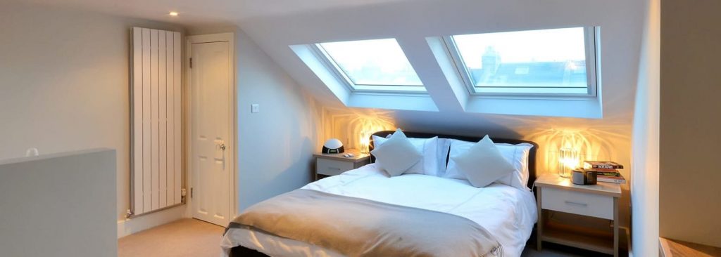 picture of a loft conversion that has been changed to a bedroom.