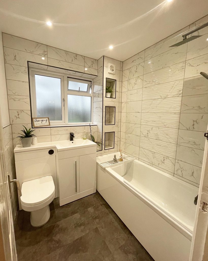 bathroom renovation project we completed in throop. modern and fresh final look, all new sanitary ware and a built in unit was put in place for all the shampoos etc. Project by The Big Conversion Company.