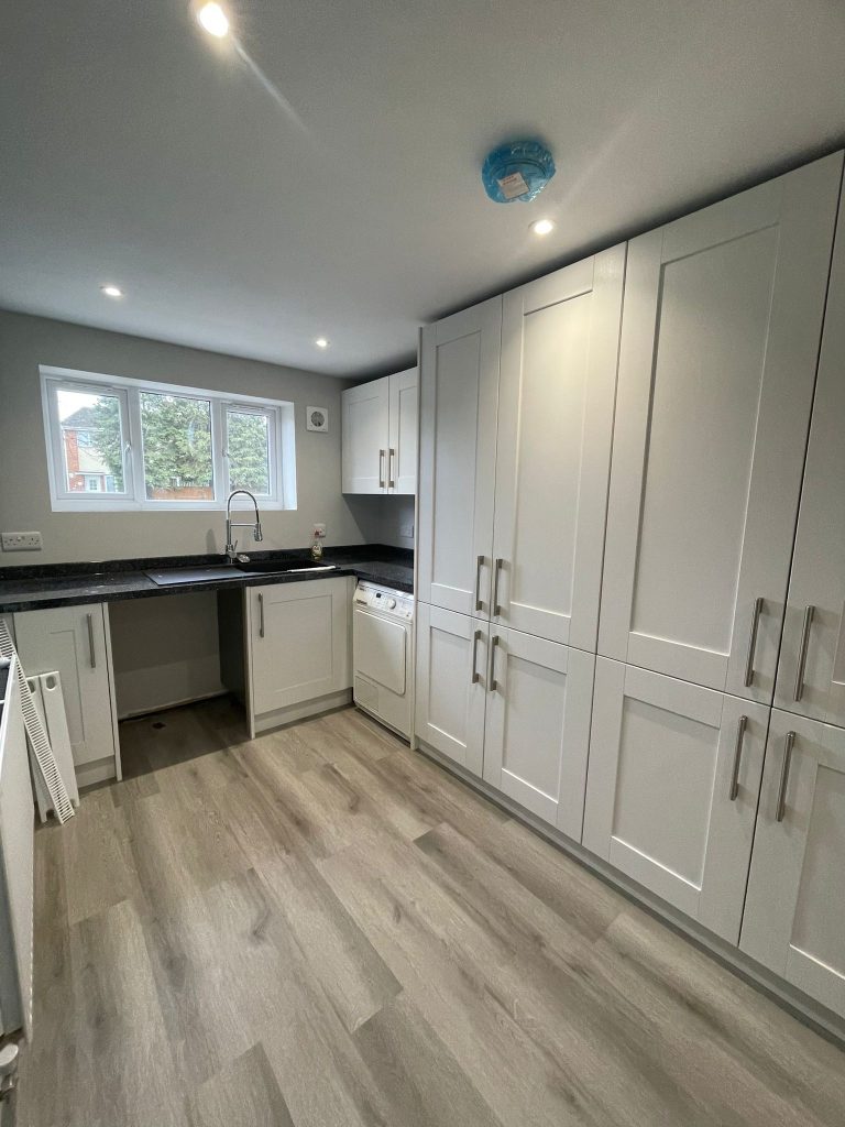 inside of a garage conversion we completed, in bournemouth. Utility room installed for the customer. Project by The Big Conversion Company.